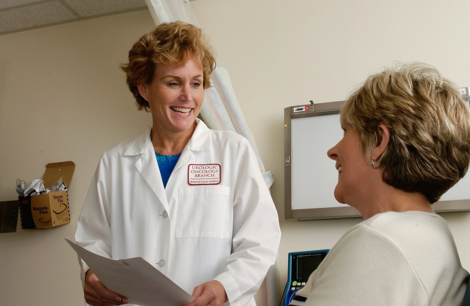Physician and patient in a clinical consult — illustrative.